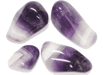 four small polished amethyst stones