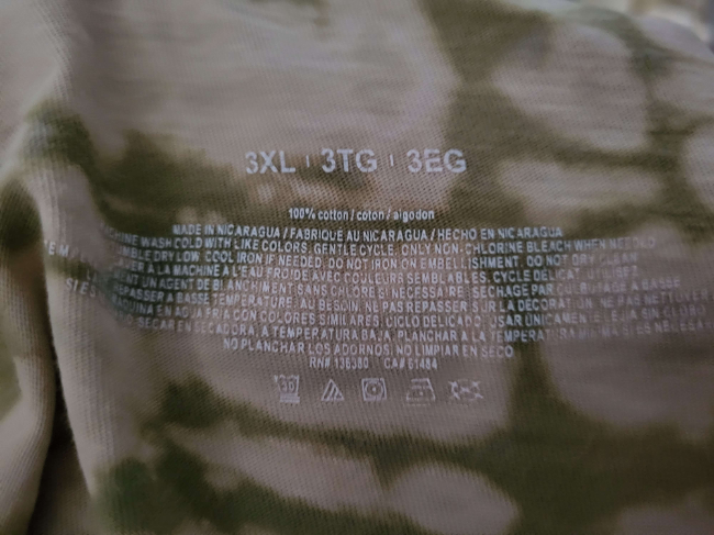 a printed label on the inside of a shirt it is 100% cotton and has other care instructions printed
