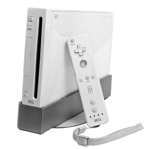 white original wii on a stand with a wiimote