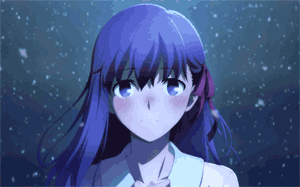 screenshot from the movie of sakura smiling and blushing in the snow